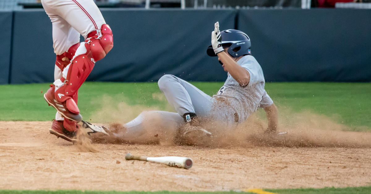 Player avoiding baseball injury 